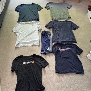 6 Nike Drifit shirts & 1 pair shorts